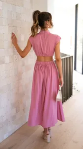 Detailed view of the pink crop top and long skirt set, showing back design and elegant style.
