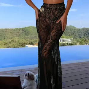 Black lace long fish tail skirt set detail, sheer fabric overlay with elegant waist chain design.
