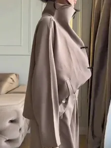 Casual loose stand collar jacket with unique toggle buttons and matching wide leg trousers set.