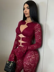Sexy burgundy lace jumpsuit with deep V neck, metal rings, and bell sleeves for women.