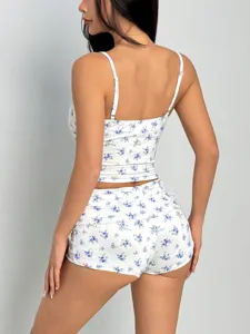 Detailed view of women's blue floral print camisole and shorts two-piece lounge set.