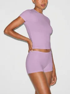 Lilac short sleeve t-shirt and matching tight shorts set, slim fit casual activewear.