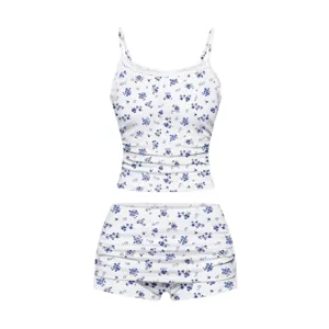 Women blue floral camisole and matching shorts two piece set, cute summer outfit.
