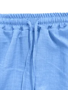 Light blue casual pants elastic waist drawstring detail close-up image for summer fashion style