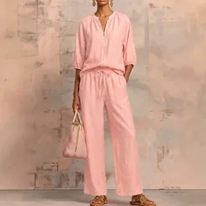 Summer casual pink solid color zipper crewneck top and wide-leg pants set for women.