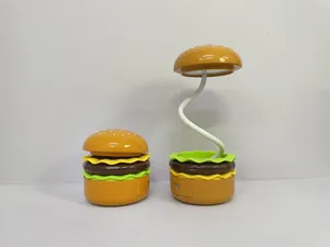 Lampe de bureau LED burger portable avec USB, trois niveaux de luminosité et design pliable pour bureau.
