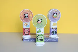 Cute cartoon panda handheld fan, USB rechargeable portable mini fan with base for students use.