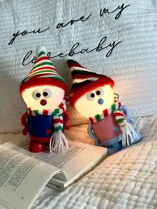 Charming Christmas snowman night light with knitted hat and scarf, cozy USB rechargeable LED lamp.