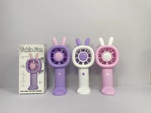 Cute rabbit ear USB rechargeable handheld mini desk fan with phone holder stand for students.