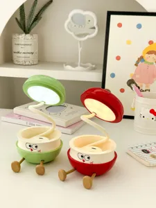 Jolie lampe de bureau pliante LED avec cou flexible et design de visage mignon pour étude de table.