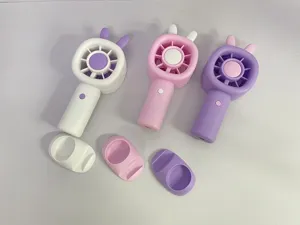 Portable handheld mini fan with cute bunny ears, three-speed USB rechargeable desk fan with base.