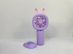 Portable mini handheld fan with cute pink bunny ears and convenient desktop base stand detail view