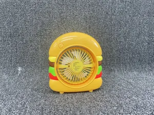 Gros plan détail du mini ventilateur de bureau rechargeable forme hamburger compact.