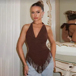 Detailed view of brown halter cowl neck top with fringe hem and back tie for women.