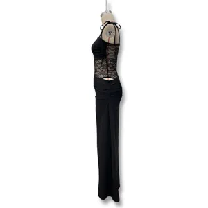 Side view detail of sexy black maxi dress featuring intricate lace splicing and cutout design.