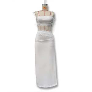 Detail view of the white sexy lace cutout camisole long dress, elegant and stylish design.