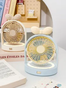 Joli ventilateur de bureau avec nœud et lumière LED, mini ventilateur portable rechargeable.