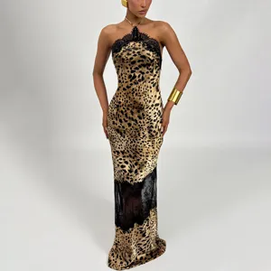 Detailed view of the sexy halter leopard print sheer bodycon dress with black lace trim.