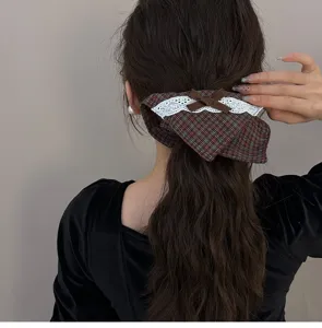 British style plaid hair scrunchie with white lace trim and cute brown bow for women ponytail.