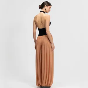 Women's halter neck splicing jumpsuit featuring ruched back and loose wide leg casual style.