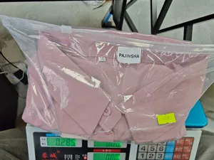 Camisa de mujer de color sólido con volantes plisados rosa holgada casual primavera verano