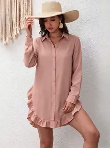 Vestido camisa rosa de manga larga con dobladillo con volantes y botones para estilo.