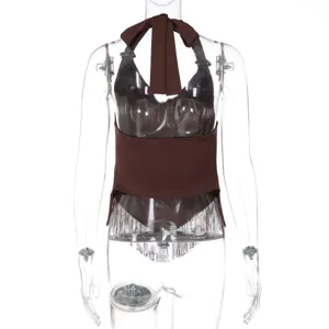 Brown halter neck top detail, featuring stylish bow tie-up straps and chic fringe hemline.