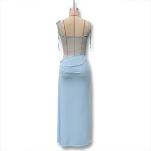 Detail view of the sexy light blue slip dress featuring sheer lace back and elegant straps.