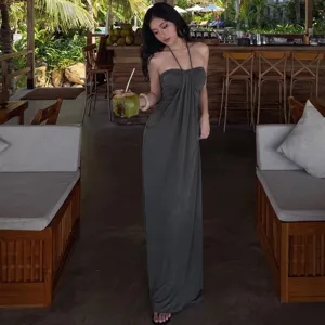 Zomer resort halter maxi jurk effen kleur rugloze elegante lange jurk voor dames.