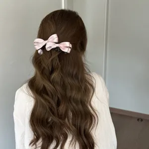 Pinza de pelo con lazo rosa minimalista coreana, elegante accesorio dulce para mujer.