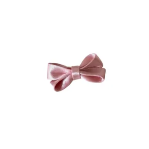Cute pink satin bow hair clip for girls, sweet Korean style hair accessory for kids.