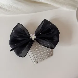 Korean black mesh bow hair comb with rhinestone star, elegant hair accessory for women.