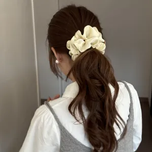 Elegant satin scrunchie for women, soft hair tie with high elasticity for daily styling.