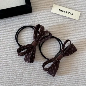 Koreaanse zoete gestippelde stoffen strik haarelastiek elegante elastische haarband set