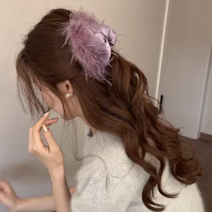 Purple feather hair claw clip for women, elegant satin shark clip for stylish daily hair styling.