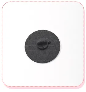 Close-up detail view of the black metal Halloween brooch pin back with rubber clasp.