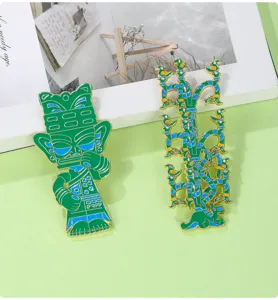 Detailed shot of Sanxingdui bronze mask and sacred tree enamel pins, vintage cultural gifts.