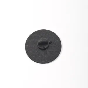 Round metal brooch pin back featuring geometric cube pattern and black rubber clutch.