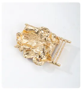 Close-up back view of a gold-toned Santa Claus brooch, showing the secure pin and catch.
