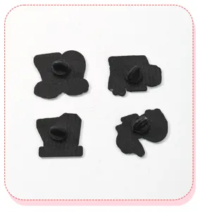 Back view of four alloy enamel lapel pins with secure rubber clasps, casual backpack badge.