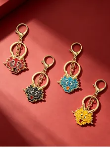 Detailed view of colorful Chinese zodiac dragon metal keychains, stylish bag charm pendant.