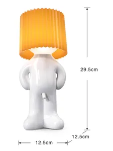 Shy boy novelty USB charging night light with orange pleated shade, 29.5cm height desktop lamp.