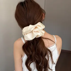 Elegant satin hair scrunchie for women, soft fluffy ponytail holder hair accessory.