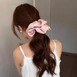 Elegant pink silk satin hair scrunchie for women, soft ponytail holder hair accessories.