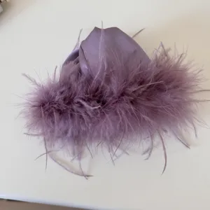 Elegant purple satin feather hair claw clip for women, stylish plush hair accessory for daily wear.