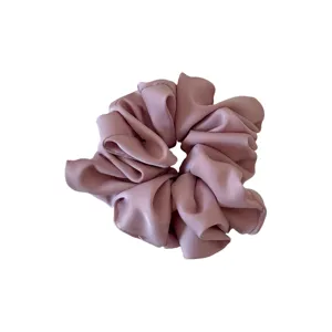 Pink satin hair scrunchie for women, soft elastic hair accessory for daily casual hair styling.