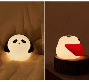 Cute silicone panda night light detail view, soft warm bedside lamp with tap control.