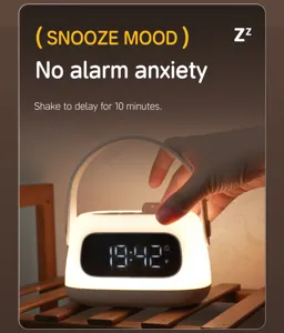 Portable digital alarm clock night light with LED display, USB rechargeable bedside lamp.