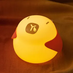 Cute silicone night light with warm LED lighting, tap control bedside lamp for bedroom.