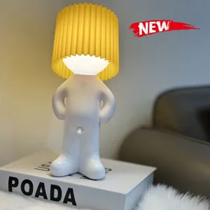 Cute shy boy night light detail, USB rechargeable bedside ambient lamp with two-dimming modes.